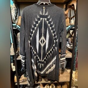 Beautiful Aztec sweater size small, designers closet by billabong